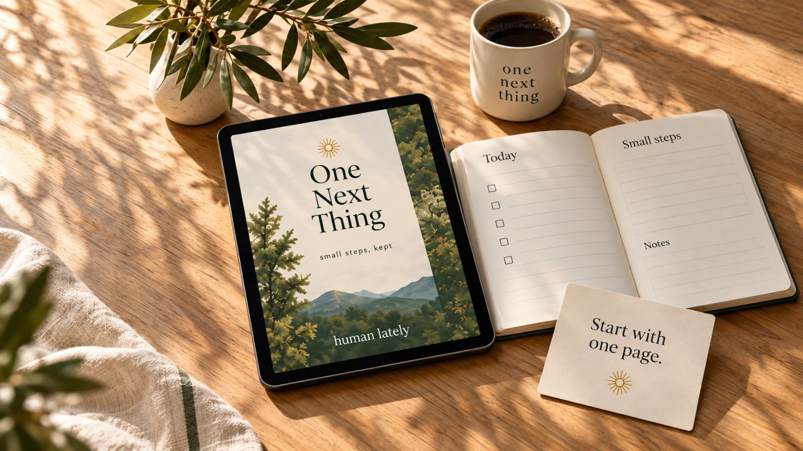 A sunlit wooden desk with a tablet showing a One Next Thing cover, an open notebook with Today, Small steps and Notes pages, a mug and a small card reading Start with one page.